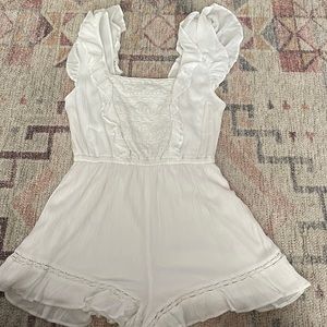 White romper, great condition with cute detailing